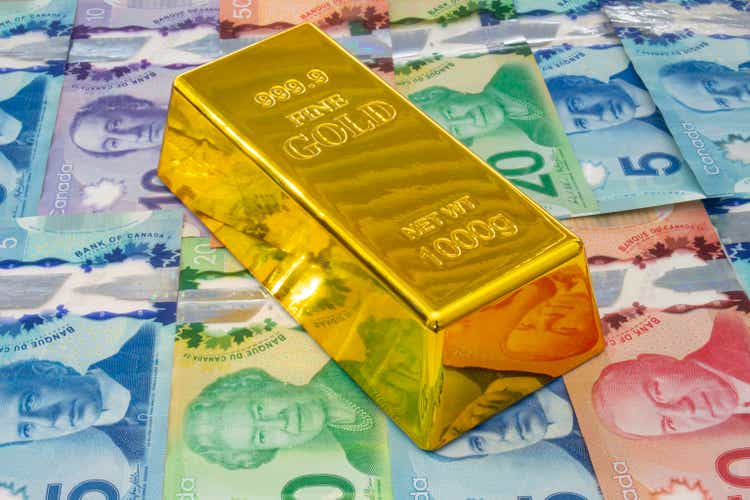 A Gold Bar or Golden Brick Bullion on Canadian Bills currency.