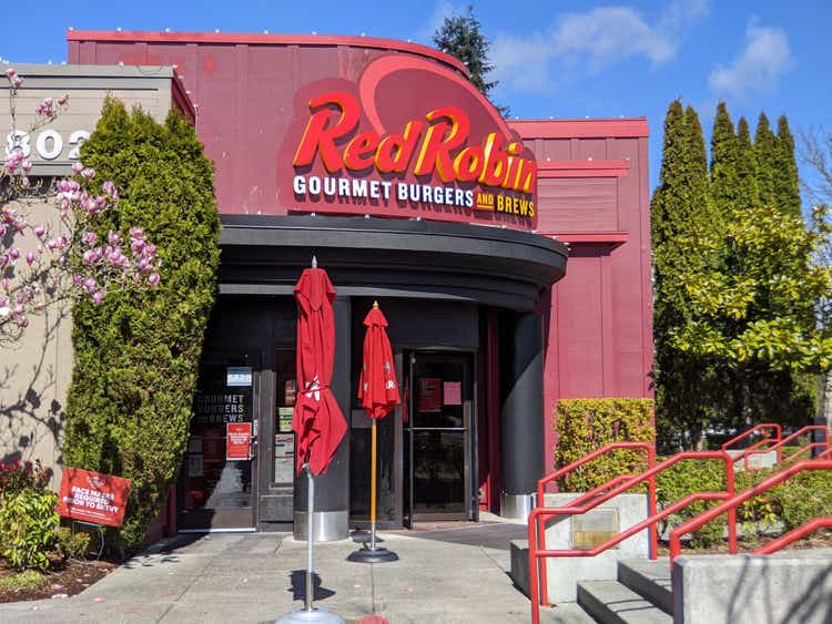 Street view of a Red Robin gourmet burger restaurant on a bright sunny day