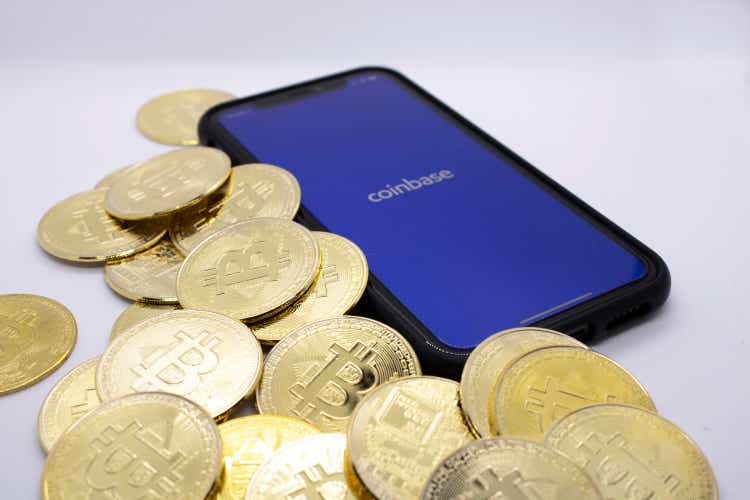 Coinbase stock rises 3% as diversified revenue, cost cuts push