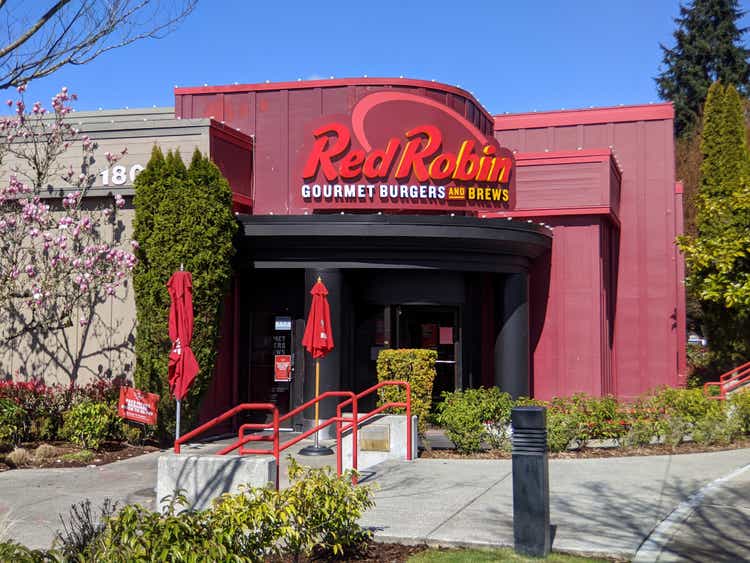 Street view of a Red Robin gourmet burger restaurant on a bright sunny day