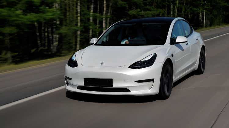 Performance of Tesla Model 3 in 2021. No license plate.