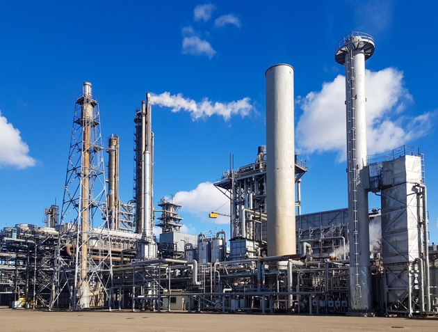 Large-capacity workshop for the production of ammonia of a petrochemical plant. Exterior of tube furnace, Shaft converter, CO2 adsorber with copy space.