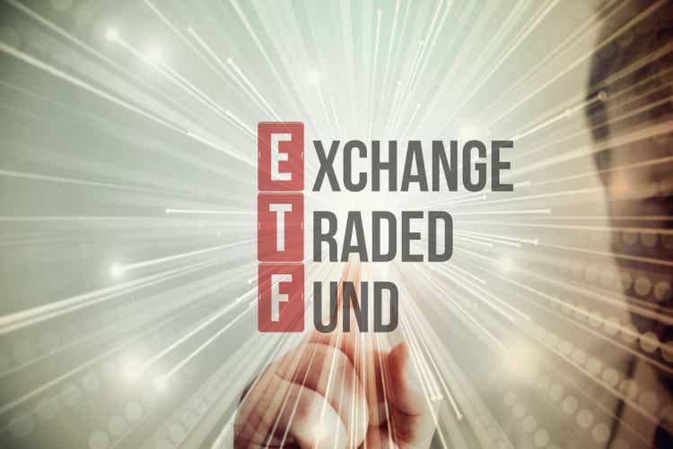 A Man Points to ETF Exchange Traded Fund