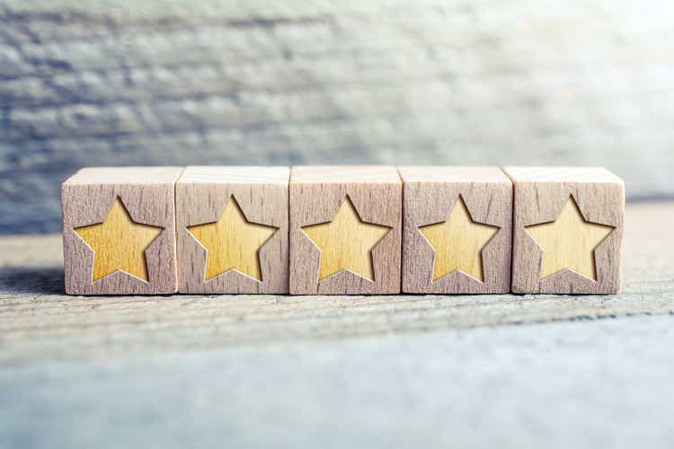 5 Star Ranking Formed By Wooden Blocks On A Board - Quality Concept