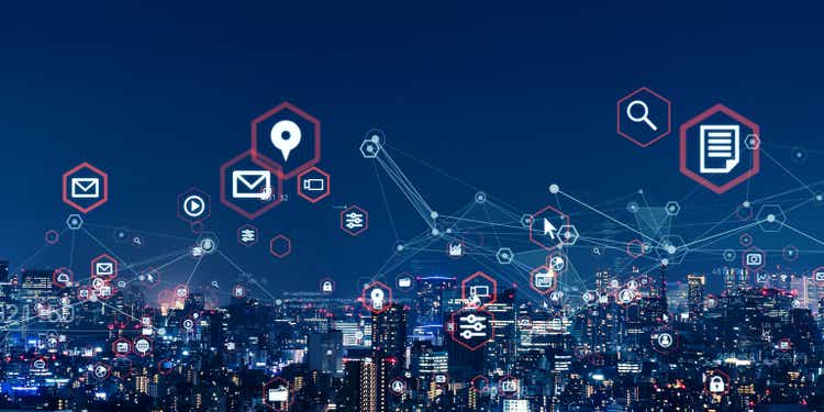 Modern cityscape and communication network concept. Telecommunication. IoT (Internet of Things). ICT (Information communication Technology). 5G. Smart city. Digital transformation.