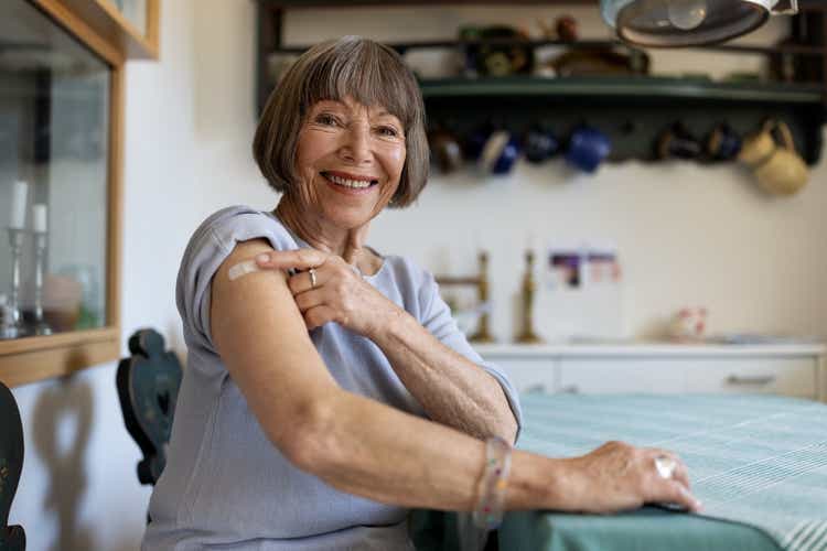 Senior woman feeling proud after getting covid-19 vaccine