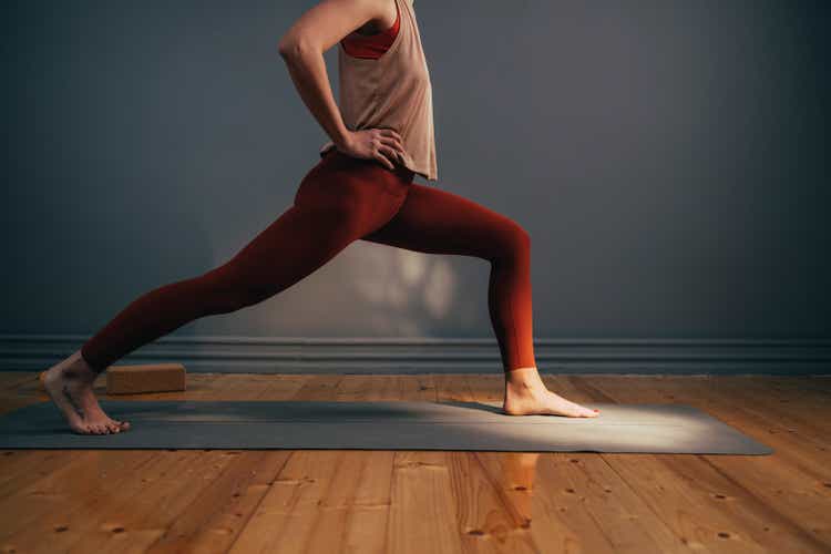 Unrecognizable Young Woman Exercising in an Indoors Gym