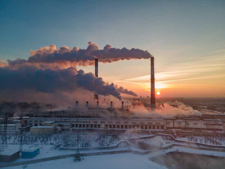 Plant pipes pollute atmosphere. Industrial factory air pollution