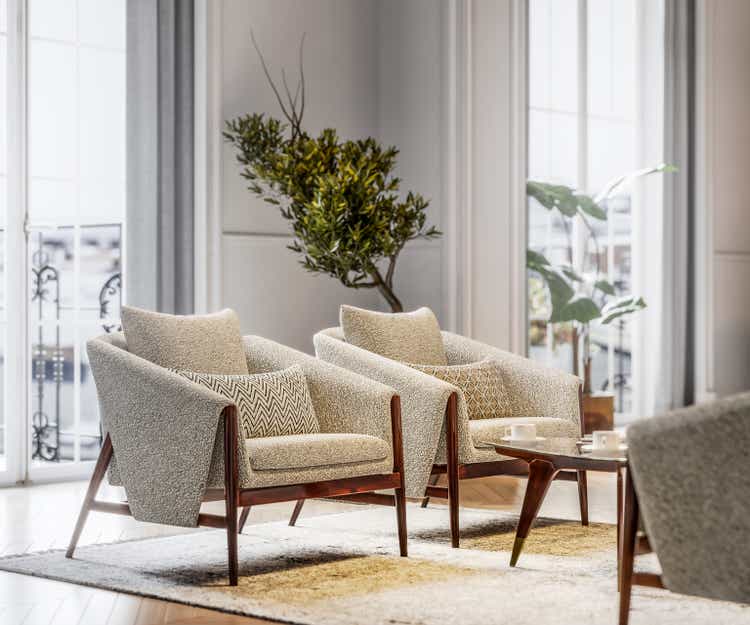 Elegant armchairs in bright living room