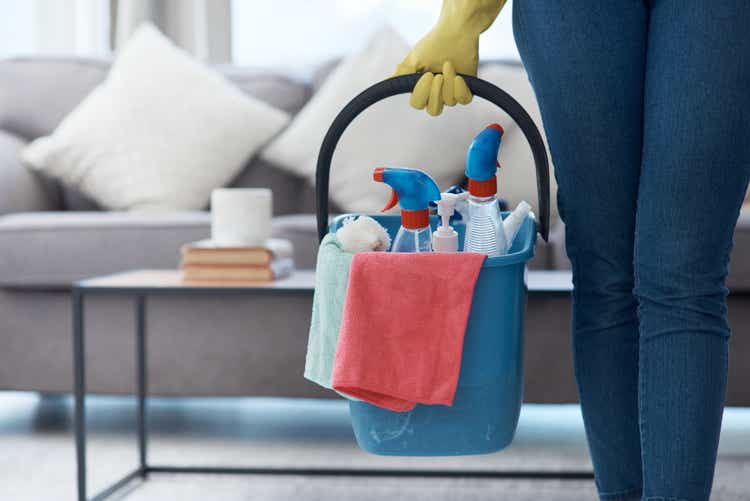 Shot of an unrecognizable woman holding a bucket of cleaning detergent before mopping her floors at home