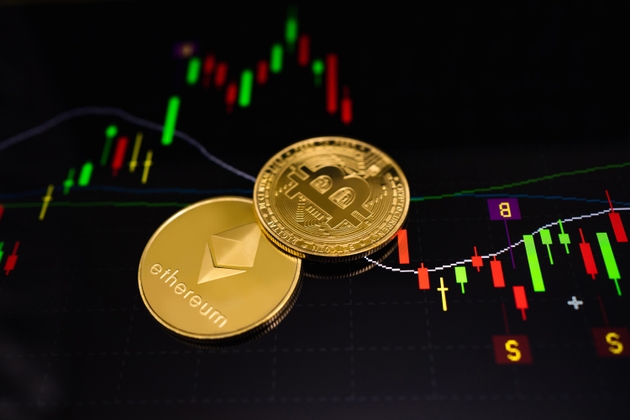 Gold Ethereum coin (<a href='https://seekingalpha.com/symbol/ETH' title='Grayscale Ethereum Staking Mini ETF'>ETH</a>) and gold Bitcoin coin (<a href='https://seekingalpha.com/symbol/BTC' title='Grayscale Bitcoin Mini Trust ETF'>BTC</a>) with a graph chart. Trading on the cryptocurrency exchange. Cryptocurrency Stock Market Concept.