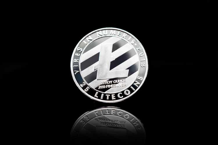 Cryptocurrency coin - Litecoin coin, isolated on a black background.