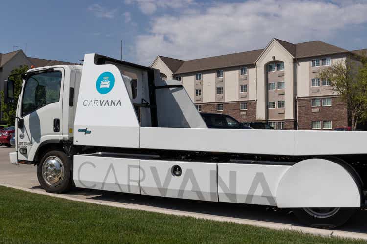 Carvana Vehicle Transport loader. Carvana is an online only preowned and used car dealership.