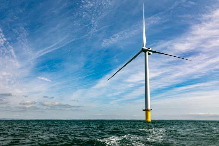 Offshore windfarm turbine and expanse of sea and sky