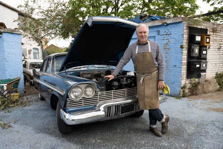 Proud restorer of classic 1950s American sedan
