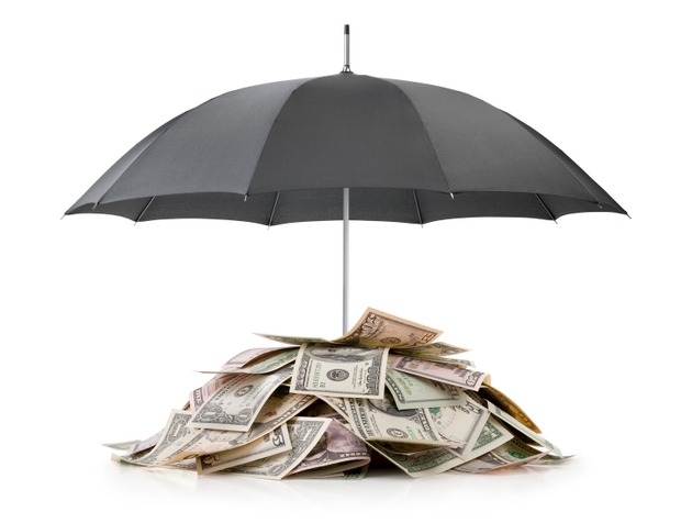 Heap of money under the umbrella