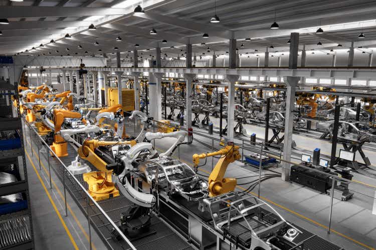 Cars on production line in factory