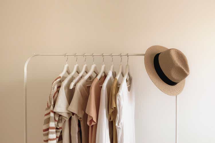 Rack with stylish women"s summer clothes. Concept for shopping store, beauty, fashion