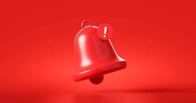 Red danger alarm bell or emergency notifications alert on rescue warning background with security urgency concept. 3D rendering.