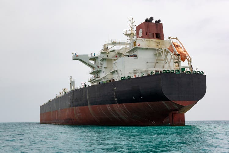 Oil Tnaker ship exporting oil barrels from the Persian Gulf, Iran