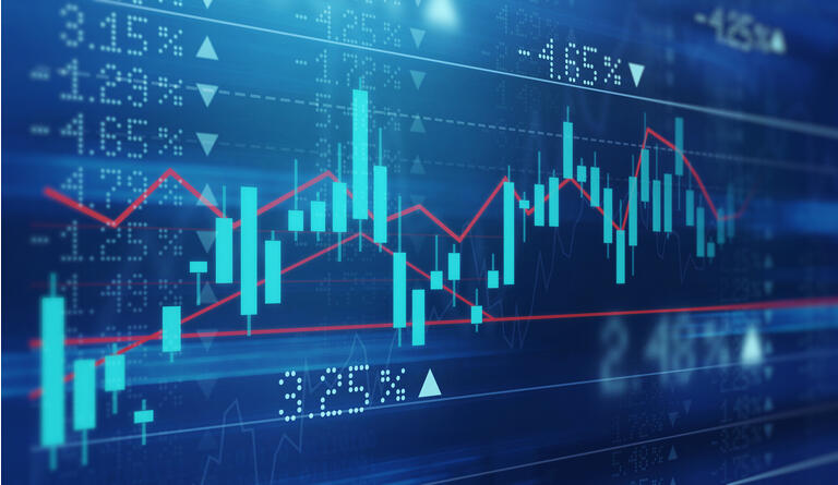 Digitally enhanced shot of a graph showing the ups and downs shares on the stock market