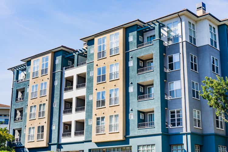 Exterior view of modern apartment building offering luxury rental units in Silicon Valley;  Sunnyvale, San Francisco Bay Area, California