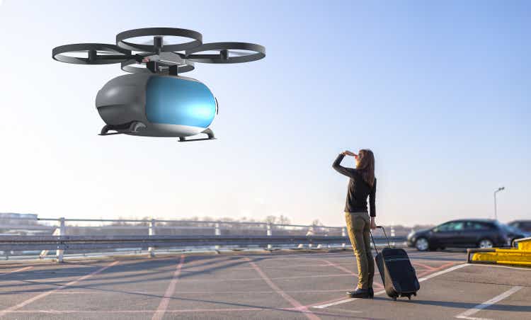 woman waiting for passenger drone transport
