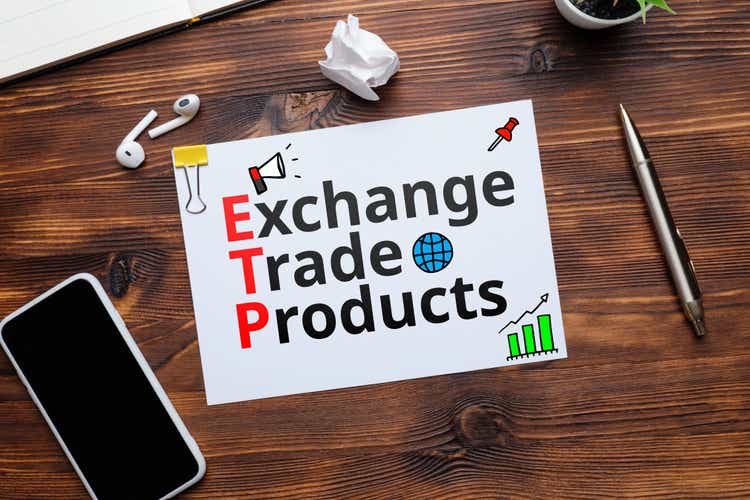 exchange-traded product ETP Electronic marketplace lettering on a sheet of paper on the table