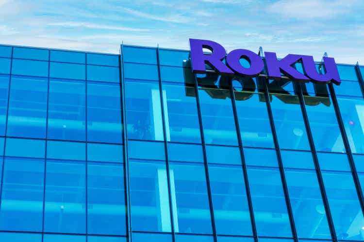 Roku sign and logo on the modern facade of consumer electronics and broadcast media company headquarters in Silicon Valley