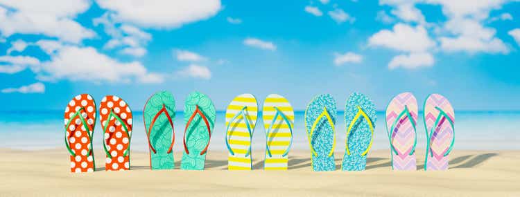 Colorful flip-flops on sand beach, Summer holiday concept 3d render
