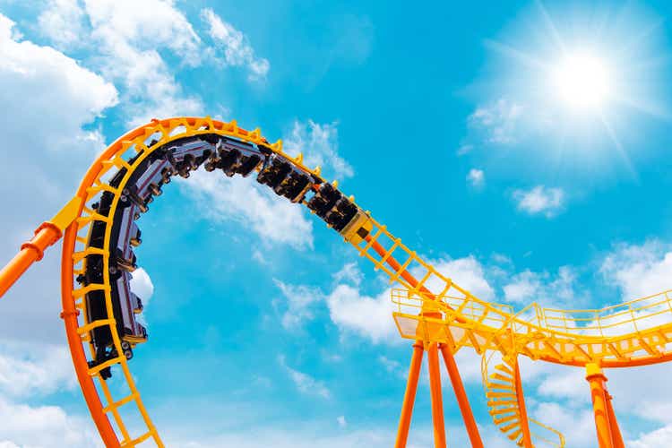 Unwinding The Fed's Balance Sheet May Cause Chaos For Stocks 2 roller coaster high in the summer sky at theme park most excited fun and joyful playing machine