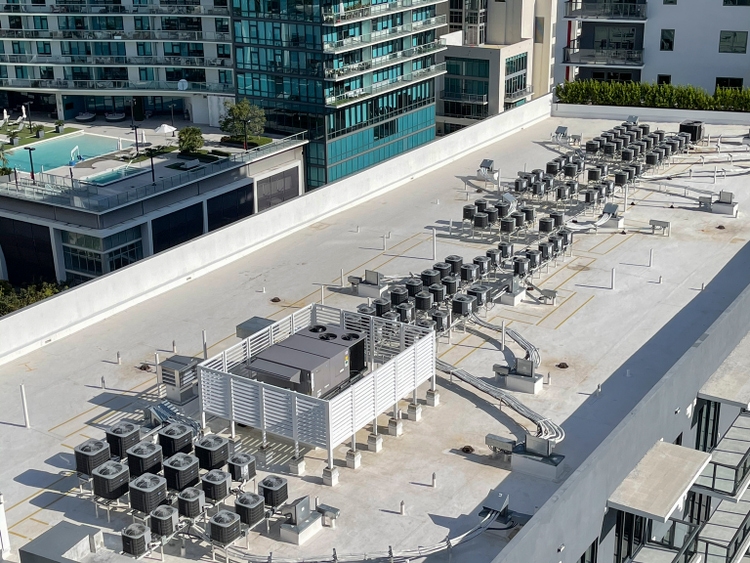 Air conditioning units installed on rooftop of of office building