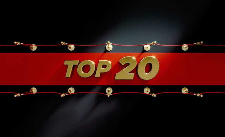 Top 20 Red Carpet Concept - Top 20 Sitting On Red Carpet Over Black Background