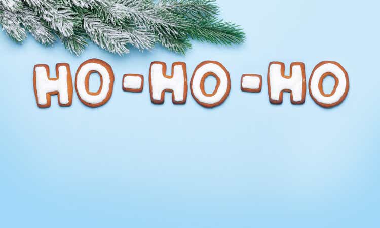 Christmas greeting card with homemade gingerbread HO HO HO