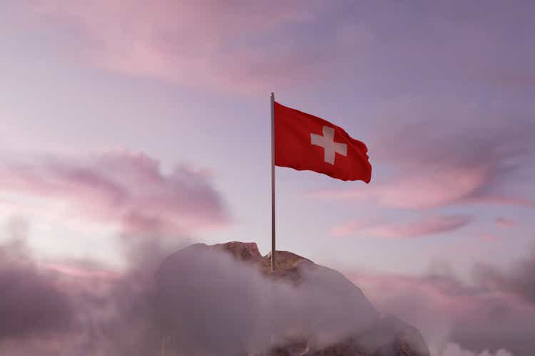 3d rendering of waving Swiss flag on rocky landscape and white clouds