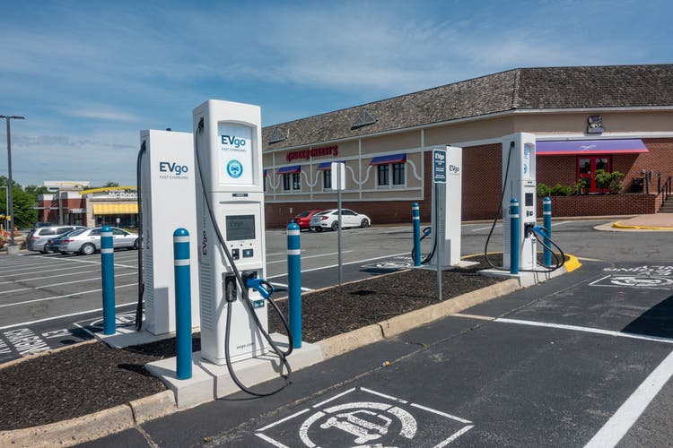 EVgo EV fast charger network in a parking lot.
