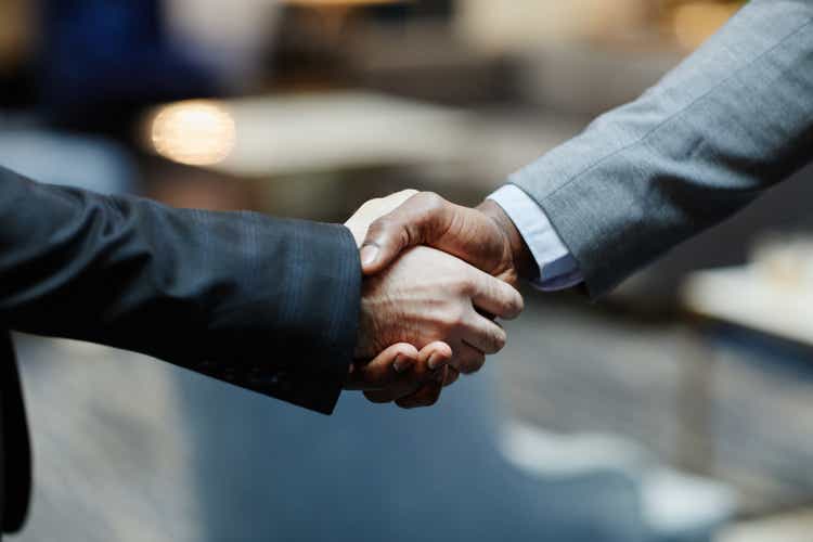 Close Up Business People Shaking Hands