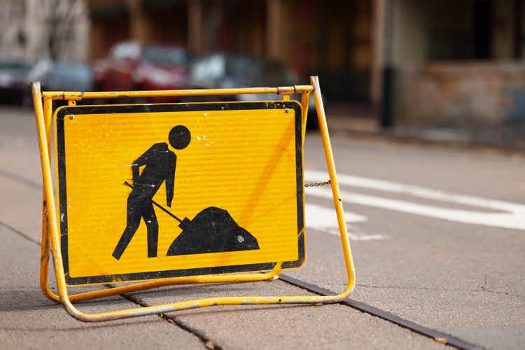 Yellow road construction sign