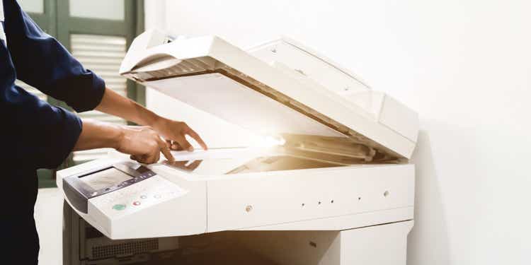 Business people keypad hand on the panel printer