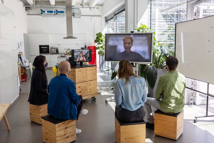 Entrepreneur doing video call with colleagues