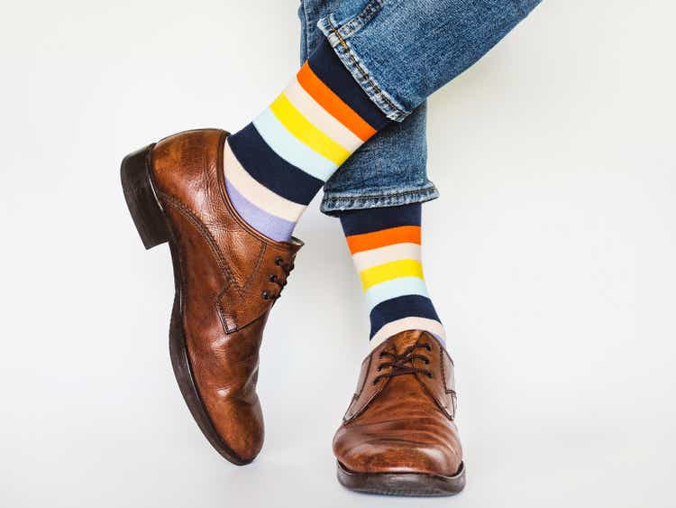 Men"s legs, trendy shoes and bright socks