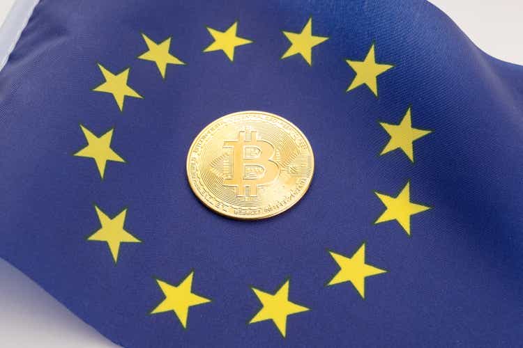 Bitcoin coin on European Union flag