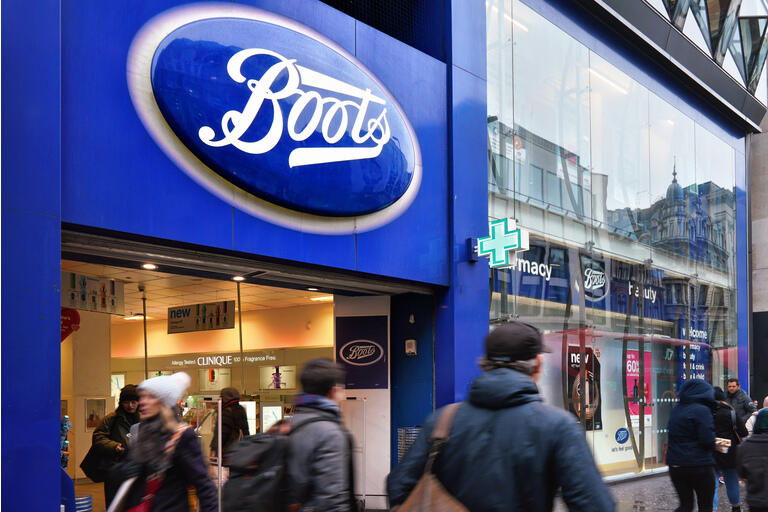 Blue oval sign at one of many Boots branches in London