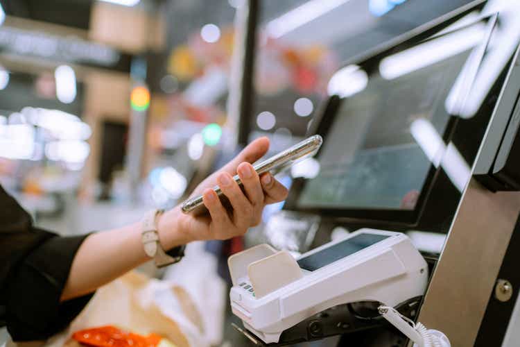 Pay by smartphone at the department store.