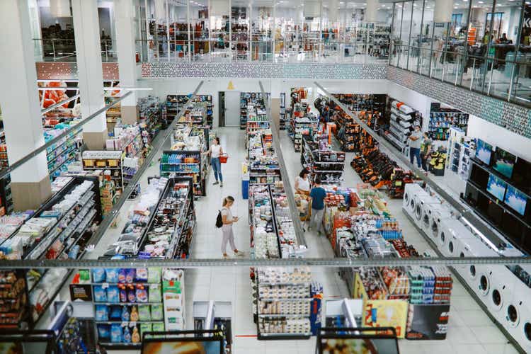 Overhead image of people buying in the large supermarket