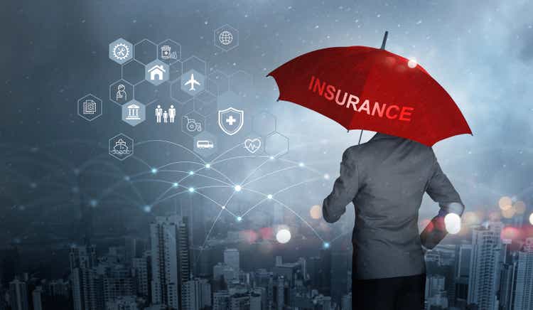 Insurance concept, Businessman holding red umbrella on falling rain with protect with icon business, health, financial, life, family, accident and logistics insurance on city background