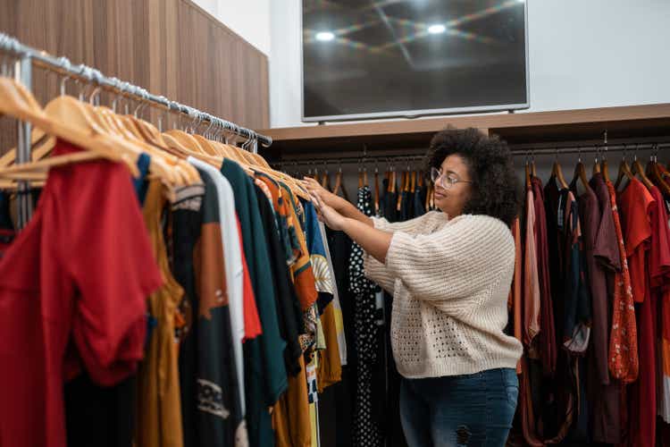 Afro woman buying clothes