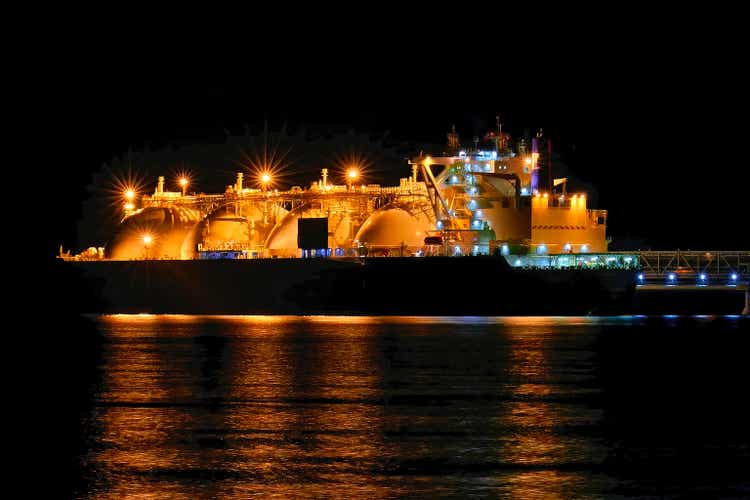 LNG tanker in port at night. Gas carrier at the GAS terminal