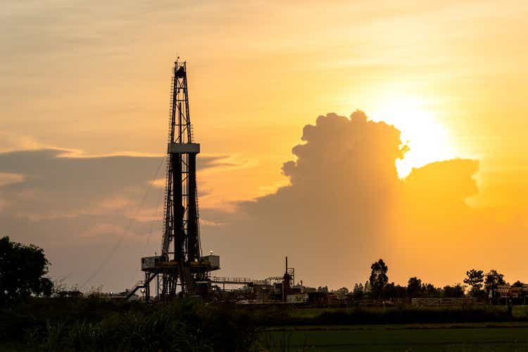 Silhouette black shadow of oil exploration drilling rig.