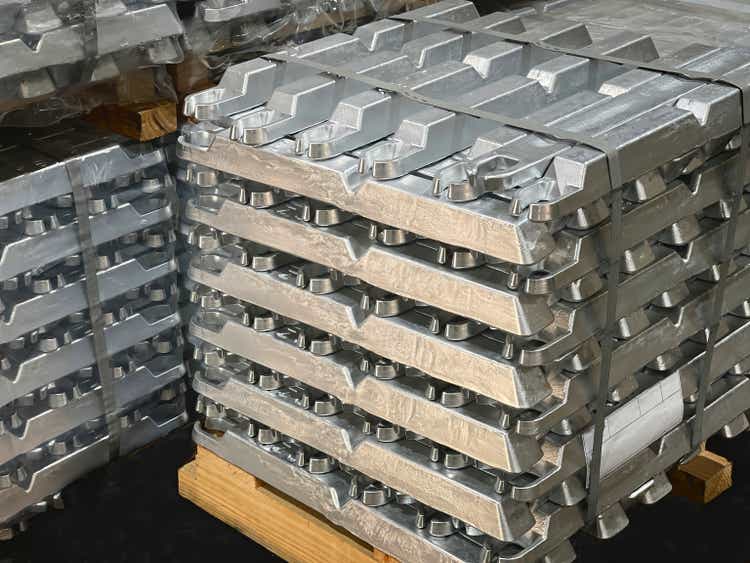 aluminum ingots stacked on a pallet, raw material, aluminum alloy ready to be processed